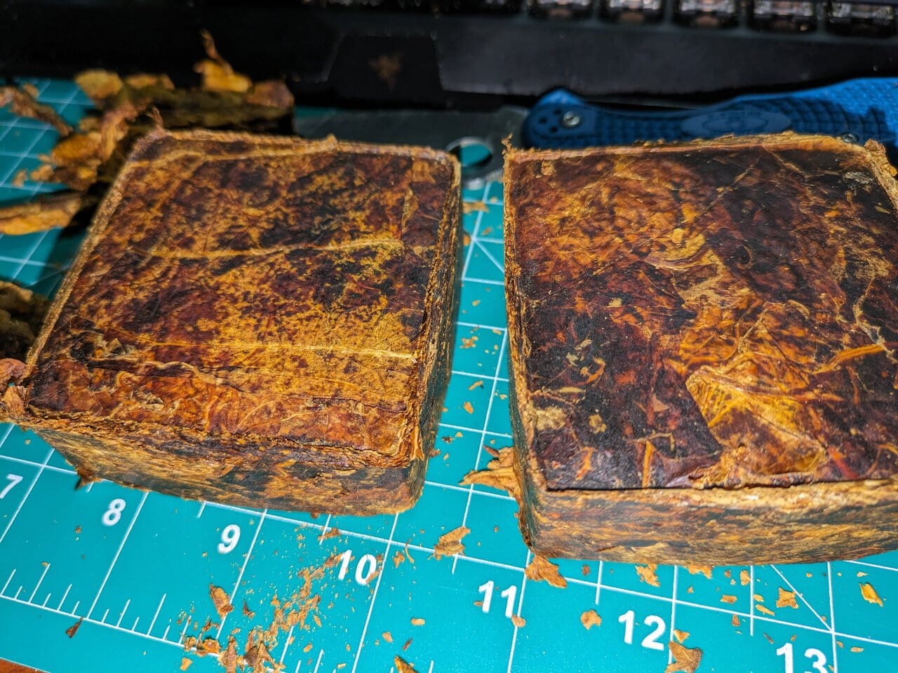 two 175g red Virginia plugs cased with tonka bean