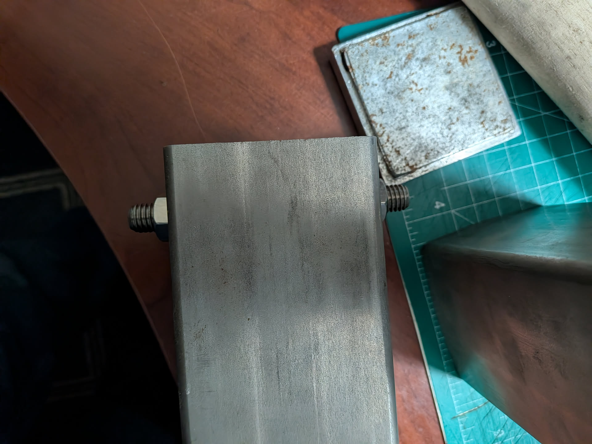 Add bolts to hang the tube in the frame press