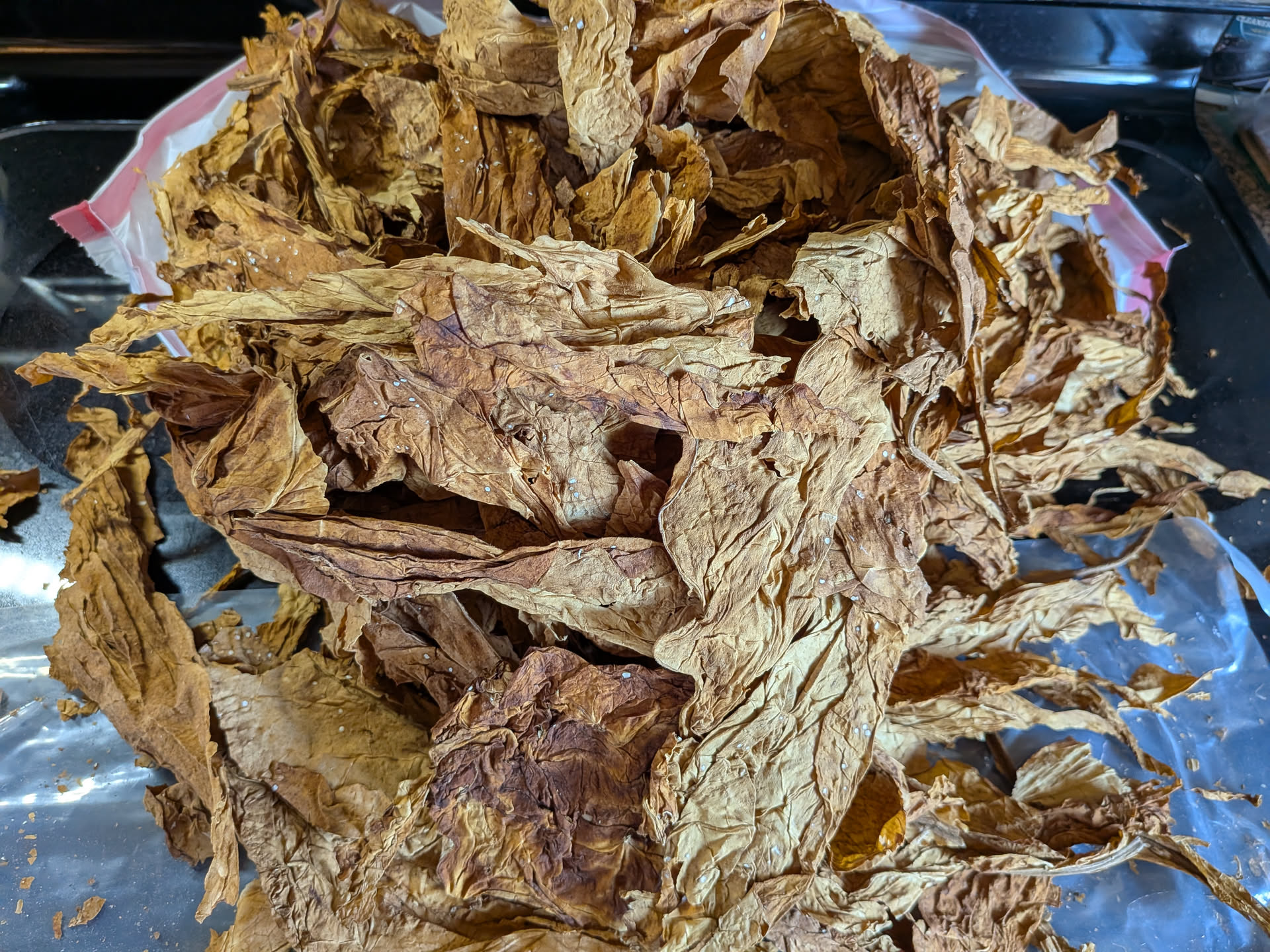 Stripping the stem from Ripe Virginia Flue Cure